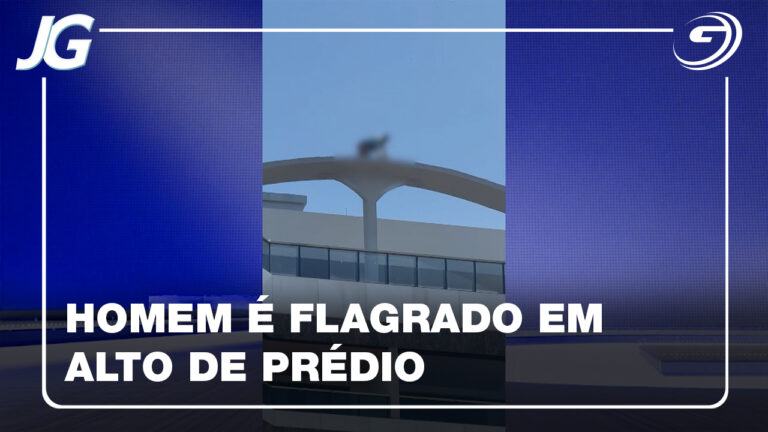 NOTA COBERTA HOMEM CIMA DE PREDIO E CABECA CORPO TURISTA MINEIRO